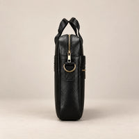 Sacoche porte-document en cuir noir à double poche, vue de profil
