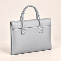 Tote porte-document en similicuir gris, vue trois-quarts
